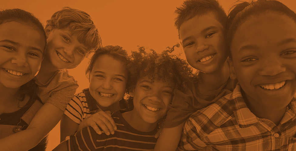 orange-scale image of a group of children